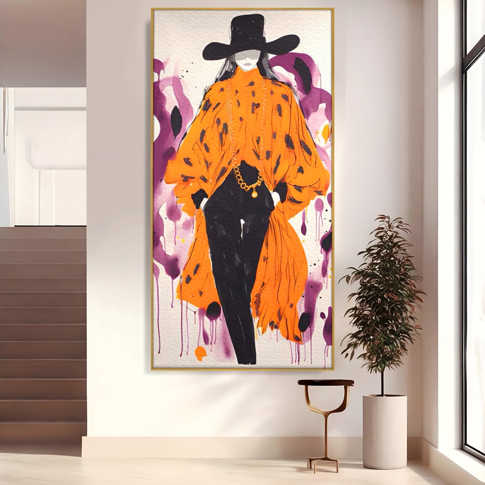 Tablou canvas cu ilustratie fashion cu femeie in costum portocaliu, in rama de aluminiu auriu